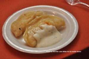 A cheese and buffalo chicken pierogie ready to be enjoyed.