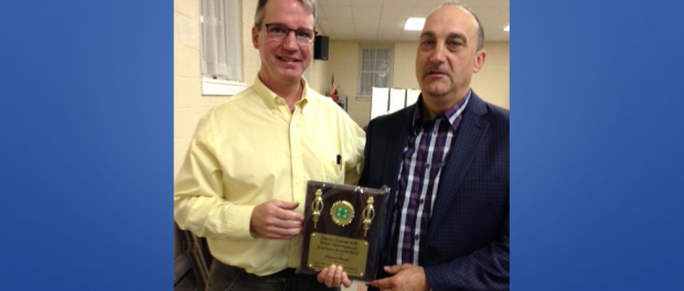 David Foord, Senior Program Coordinator at Sussex County 4-H, presented Tony Torre, Vice President/Business Development Officer at Sussex Bank with a plaque for the Youth Development Business Award.