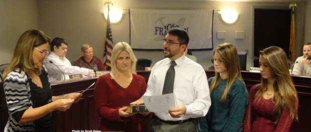 Photo by Scott Baker. David Fanale, new Franklin Borough Councilman, is sworn into the council by Franklin Borough Clerk Robin Hough (far left). Fanale's fiancee, Kerry Hodgson, holds the Bible, while Hodgson's daughters, Meghan and Kristen Sferlazzo (far right) look on.