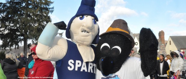 The mascots for the Krogh's Turkey Trot take a break from the festivities to strike a pose.