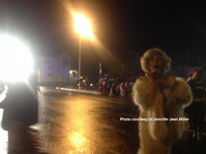 Dressed up as Marilyn Monroe and walking through the costume contest portion of the parade, blowing a kiss to my little photographer.