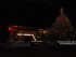 A Byram Township Fire Department Fire Truck parked alongside of the newly lit tree.