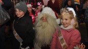Little Mr. Newton and Little Miss Newton, Matthew Teets and Danielle Penny, with Santa.