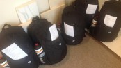 Six of the backpacks filled by volunteers at Sparta Trades Kitchens and Baths, which were distributed to area homeless veterans.