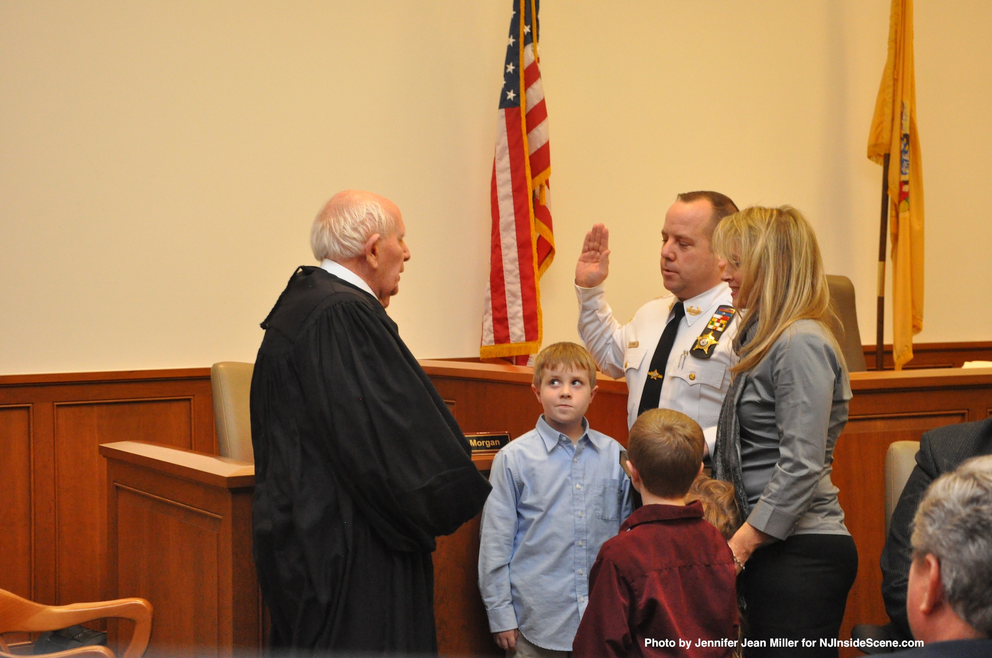 Sheriff Michael Strada, with his family, at the swearing in, with Judge Frederic Weber.