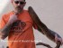 A photo of Gerald Andrejcak pictured with a snake he has cared for. Photo courtesy of Gerald Andrejcak.