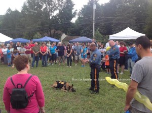 A K-9 Dog lays obediently per the command of one of the Morris County Sheriff's Officers. Photo by Jennifer Jean Miller.