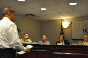 Joe Martinez takes his turn to speak in front of the council. Photo by Jennifer Jean Miller.