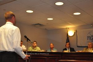 Michael Rathbun was the last of the three council members to speak. Photo by Jennifer Jean Miller.