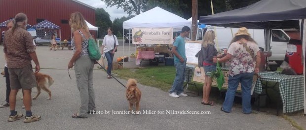 Attendees enjoy the Blairstown Farmers' Market, including those on four legs. Some make a stop at the Coffee Coops both during their visit. Photo by Jennifer Jean Miller.