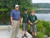 Chuck Roberts (left) with Boy Scouts fishing at summer camp. Photo courtesy of the Boy Scouts of America, Patriots' Path Council.
