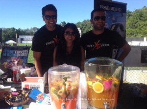 Representatives Prady, Vasu, and Mohit XS Energy Drink offered samples of their energy drink, as well as full-size drinks for sale. Photo by Jennifer Jean Miller.