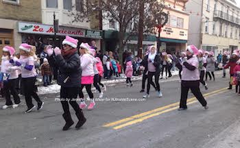 Dancers Zumba along the parade route. Photo by Jennifer Jean Miller.