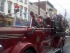 Santa waves from atop the vintage Newton Fire Truck in the holiday parade. Photo by Jennifer Jean Miller.
