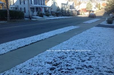 Snow dusted along the front yards of Trinity Street in Newton. Photo by Jennifer Jean Miller.