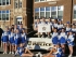 Nevin Mattessich, right, President of FOP Lodge 57, and Franklin Police Officer Rafael Burgos (left), along with the Franklin Varsity Cheerleaders. Photo courtesy of FOP Lodge 57.