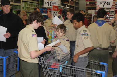 Members of Boy Scout Troop 150 shopping for their Adopt-a-Family program. Photo courtesy of Boy Scout Troop 150.