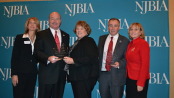 The New Jersey Business and Industry Association presents New Jersey Labor Commissioner Harold Wirths and State Senator Fred Madden with the Paul Troast Award, which is presented annually to a public servant who has made an outstanding contribution to the State of New Jersey and its business community. Pictured left to right: Michele Siekerka, NJBIA President; State Senator Fred Madden; Melanie Willoughby, NJBIA Senior Vice President of Government Affairs; Labor Commissioner Harold Wirths; and Lt. Governor Kim Guadagno. Photo courtesy of the New Jersey Department of Labor and Workforce Development.