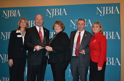 The New Jersey Business and Industry Association presents New Jersey Labor Commissioner Harold Wirths and State Senator Fred Madden with the Paul Troast Award, which is presented annually to a public servant who has made an outstanding contribution to the State of New Jersey and its business community. Pictured left to right: Michele Siekerka, NJBIA President; State Senator Fred Madden; Melanie Willoughby, NJBIA Senior Vice President of Government Affairs; Labor Commissioner Harold Wirths; and Lt. Governor Kim Guadagno. Photo courtesy of the New Jersey Department of Labor and Workforce Development.