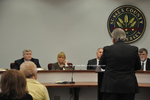 Bernard Re, Sussex County Treasurer who is resigning addresses the freeholders in a May meeting. From left to right: George Graham, Gail Phoebus, Dennis Mudrick, and Phil Crabb. Richard Vohden not pictured. Photo by Jennifer Jean Miller.