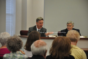 Sussex County Administrator John Eskilson, who has resigned following the solar project settlement is pictured at a recent freeholder meeting. Freeholder George Graham to his right looks on. Photo by Jennifer Jean Miller.