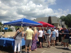 Restaurants lined up to offer some of their fare on the Boardwalk for the Fourth Annual Lake Mohawk Tasting on the Boardwalk. Photo by Jennifer Jean Miller.