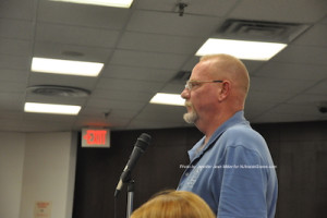 Resident Mike Alvarez asks about how emergency apparatus can navigate on the street with parking on both sides. Photo by Jennifer Jean Miller.