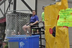 Thomas S. Russo, Jr. is spared some time from the dunk tank as a ball sails by. Photo by Jennifer Jean Miller. 