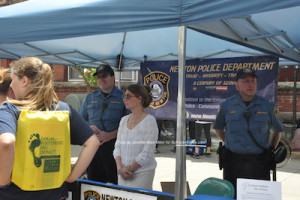 Chief Michael Richards (left), councilwoman Kristen Becker (middle) and Lt. Mark Zappa (right) share information about the Newton Police Department. 