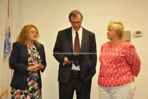 Sandra Diglio (left) and Kevin Elvidge (center) present Nancy Woods with recognition as Senior Citizen of the Year. Photo by Jennifer Jean Miller.