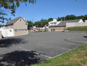 The rear of the Newton Pizza parking lot as pictured on June 7, the day following the discovery of Thomas Thum's body in the rear of this parking lot. Photo by Jennifer Jean Miller.