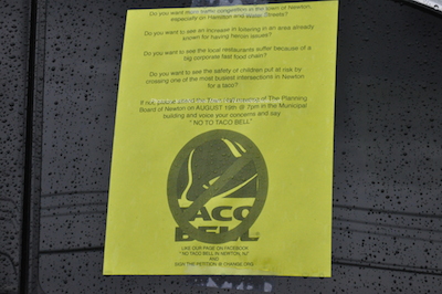 One of the signs on a vehicle that detailed reasons why residents should be against the Taco Bell construction. Photo by Jennifer Jean Miller.