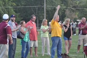 Sussex County Freeholder George Graham raises his hand to encourage cheers from the crowd. From left to right: Newton Councilman Wayne Levante, Newton Deputy Mayor Sandra Diglio, Newton Councilman Kevin Elvidge, Graham, Sussex County Freeholder and Assembly Candidate Gail Phoebus, and Town of Newton Recreation Supervisor, Debbie Danielson. Photo by Jennifer Jean Miller.