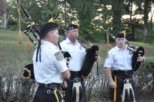 Pipers at the service. Photo by Jennifer Jean Miller. 