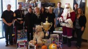 Left to right: Don Hall, The Chatterbox Drive-In; First Sergeant Christopher Piazza, United States Marine Corps; Project Self-Sufficiency Board of Directors President Beverly Gordon; Project Toys 4 Teens Coordinator Ruby Esposito; Season of Hope Toy Drive Co-Chairperson and Project Self-Sufficiency Board of Directors member Sue Murphy; Pass it Along Executive Director Diane Taylor; Newton School District Superintendent Dr. Ken Greene; Santa Claus (aka, Sussex County Freeholder George Graham); Gunnery Sergeant Matthew Hutcheson, United States Marine Corps; and Sandra Zaruba, Project Self-Sufficiency participant and Season of Hope toy shopper. Image courtesy of Project Self-Sufficiency.
