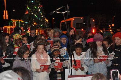 The Halsted Middle School Chorale performs in front of the medical center. Photo by Jennifer Jean Miller. 