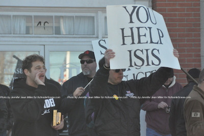 "You help ISIS," was what one of the signs on the counter demonstration side reflected. Photo by Jennifer Jean Miller. 