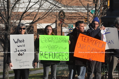 Demonstrators in Newton rallying in support of the Syrian refugees. Photo by Jennifer Jean Miller. 