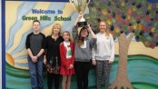 Green Hills Schools Student Council Faculty Advisor Beth Voris (second from left) with Student Council officers Ryan Rittie, Jocelyn Mull, Isobel Costello and Bridget Fajvin with the Stuff the Stocking trophy. Image courtesy of Project Self-Sufficiency.