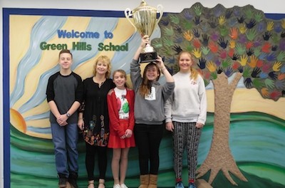 Green Hills Schools Student Council Faculty Advisor Beth Voris (second from left) with Student Council officers Ryan Rittie, Jocelyn Mull, Isobel Costello and Bridget Fajvin with the Stuff the Stocking trophy. Image courtesy of Project Self-Sufficiency.