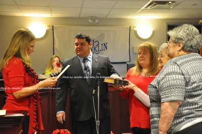 Robin Hough (far left) swears in Mayor Nicholas Giordano, who is accompanied by his wife Jennifer, grandmother Phoebe Giordano and mother Pam Giordano. Photo by Jennifer Jean Miller. 