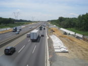 Motorists travel along a stretch of the New Jersey Turnpike. Creative commons image.